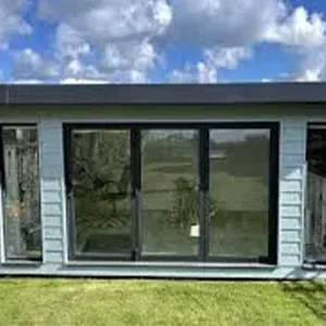 A small house with a large sliding glass door.